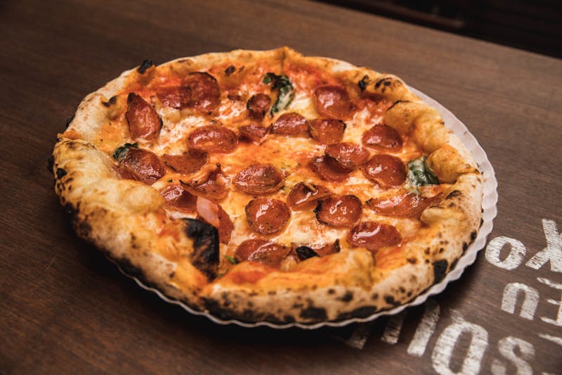 Pepperoni mods pizza loaded with toppings