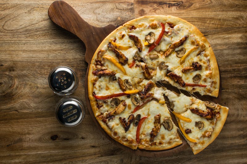 Spicy chicken pizza with jalapeños